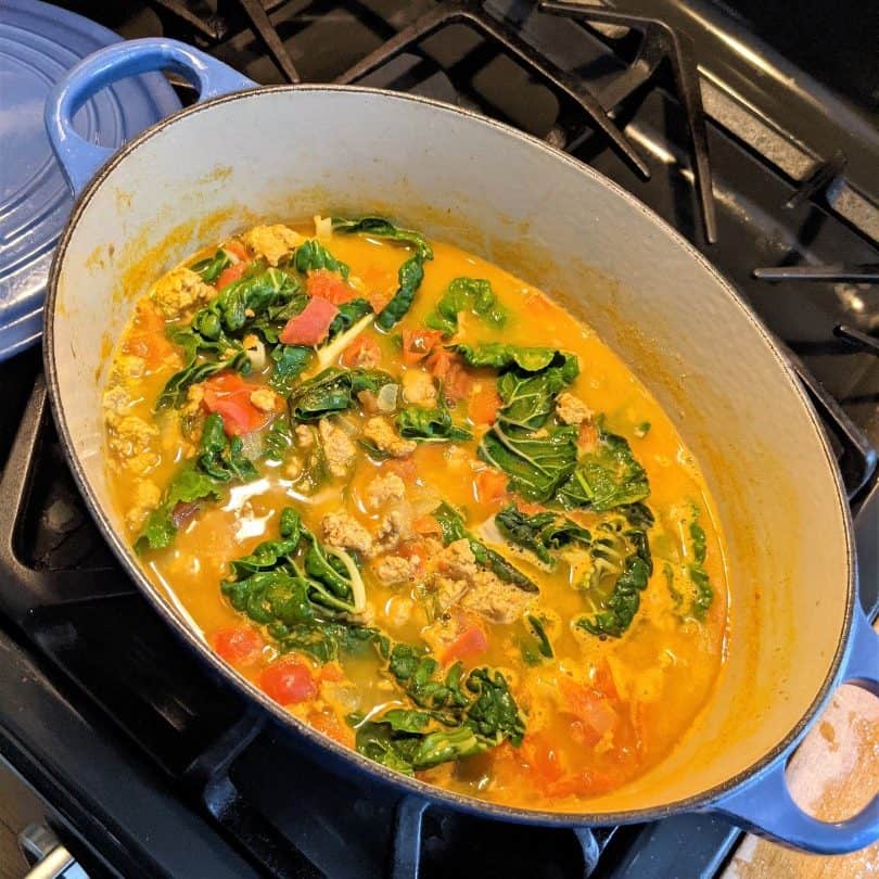 Simmering pot on the stovetop of the pregnancy soup.