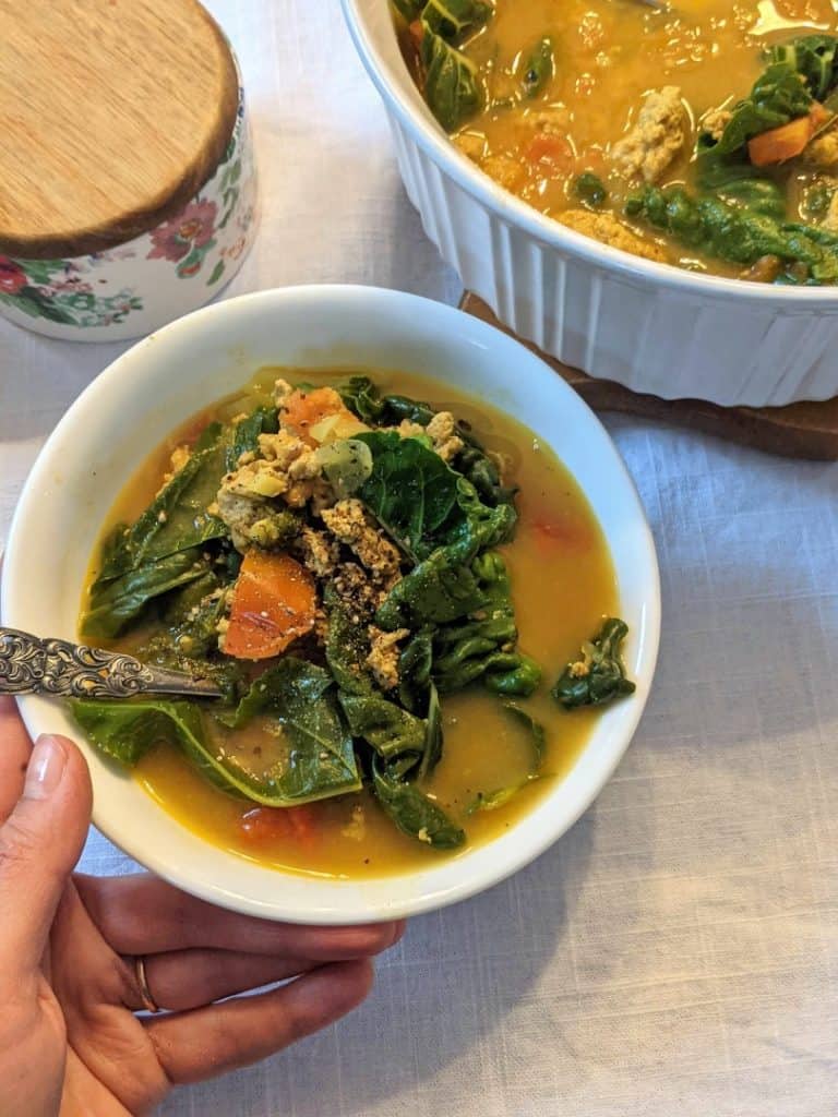 Small bowl containing the best turkey chard pregnancy soup.