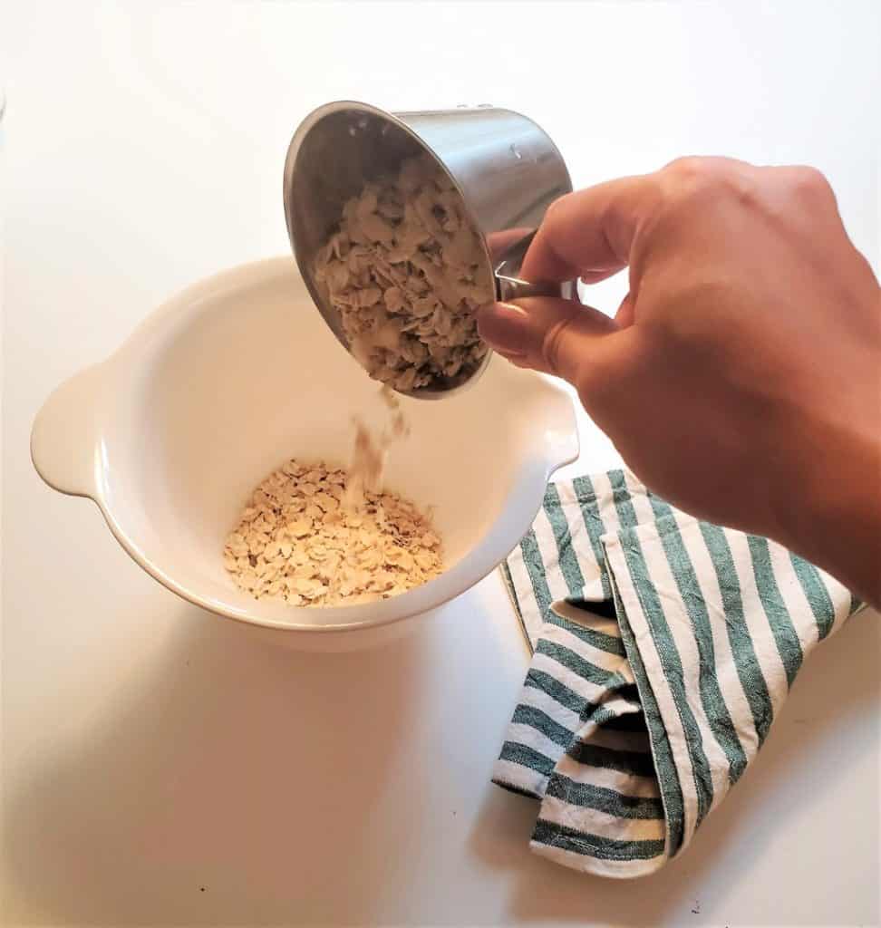 mixing oatmeal to make protein overnight oats