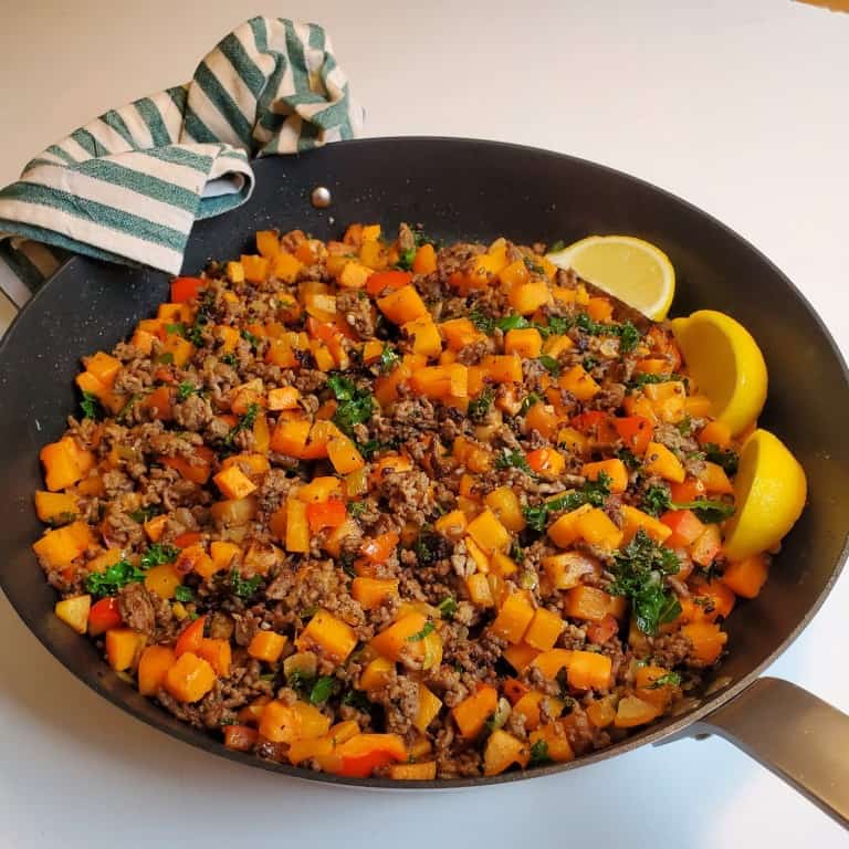Serving a dish of beef sweet potato hash