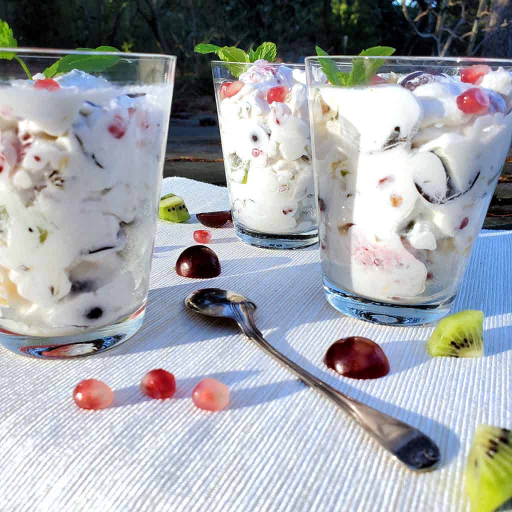 indian fruit cream dessert in individual glasses