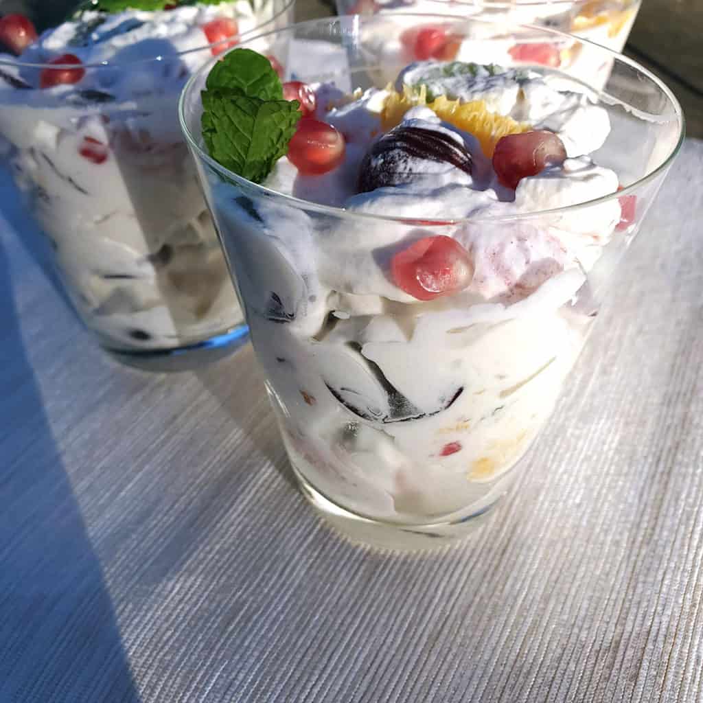 indian fruit cream dessert in individual glasses