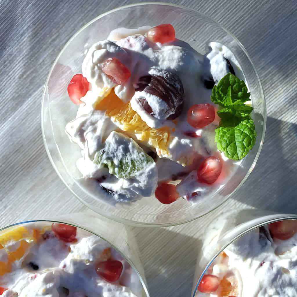 indian fruit cream dessert in individual glasses