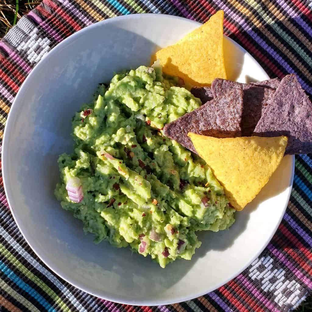 4-Ingredient Guacamole in Bowl with Tortilla Chips