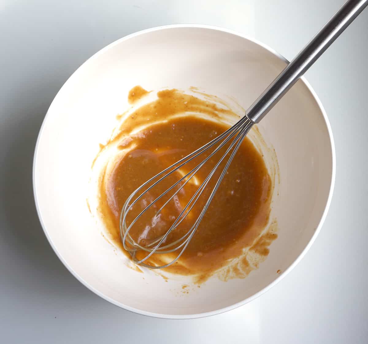 Whisking the Bowl of Caramel Sauce